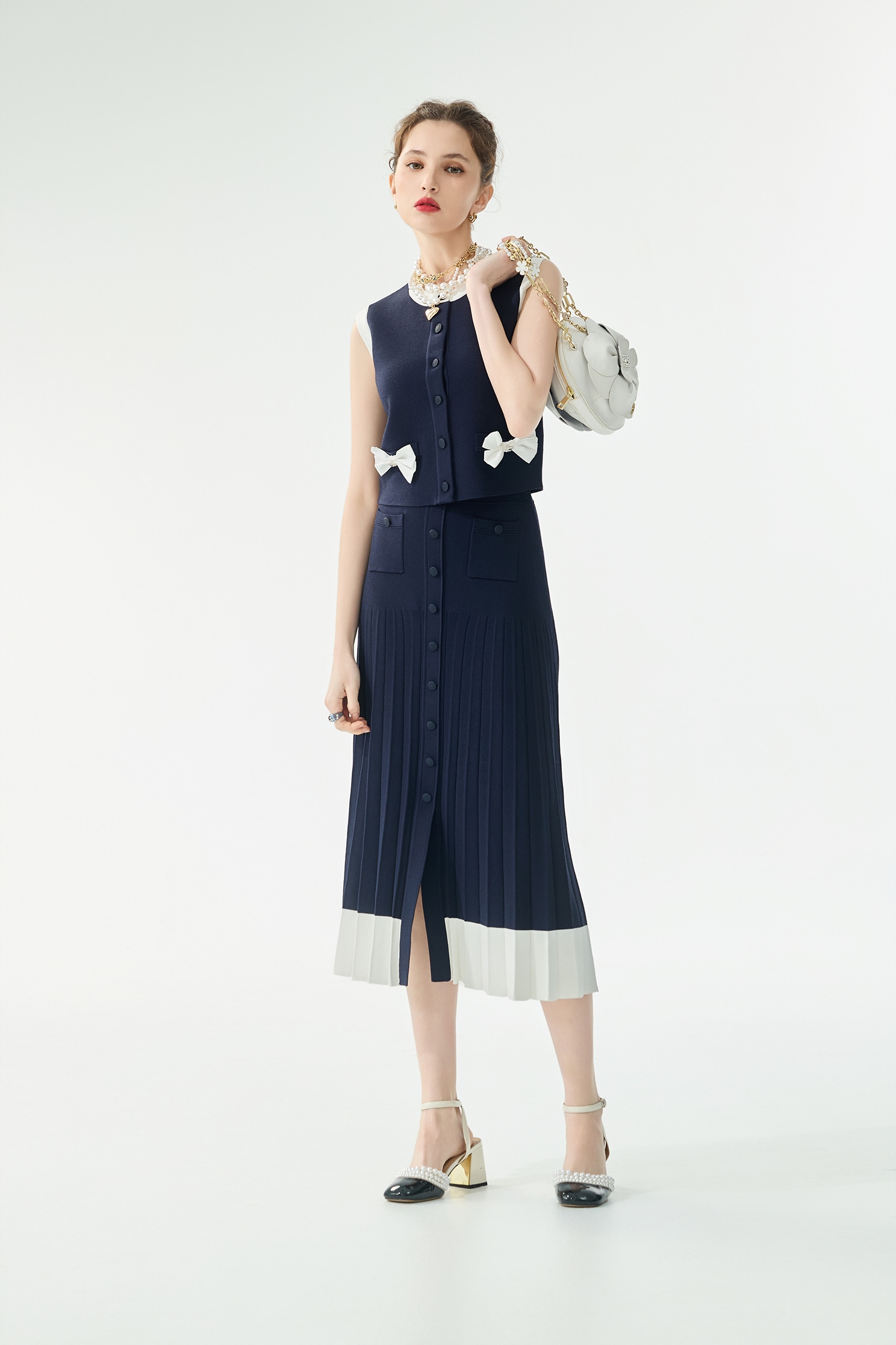 經典海軍藍針織配色背心經典海軍藍針織配色背心,一般背心,一般背心馬甲,上衣,春夏穿搭,背心,蝴蝶結,針織,針織背心