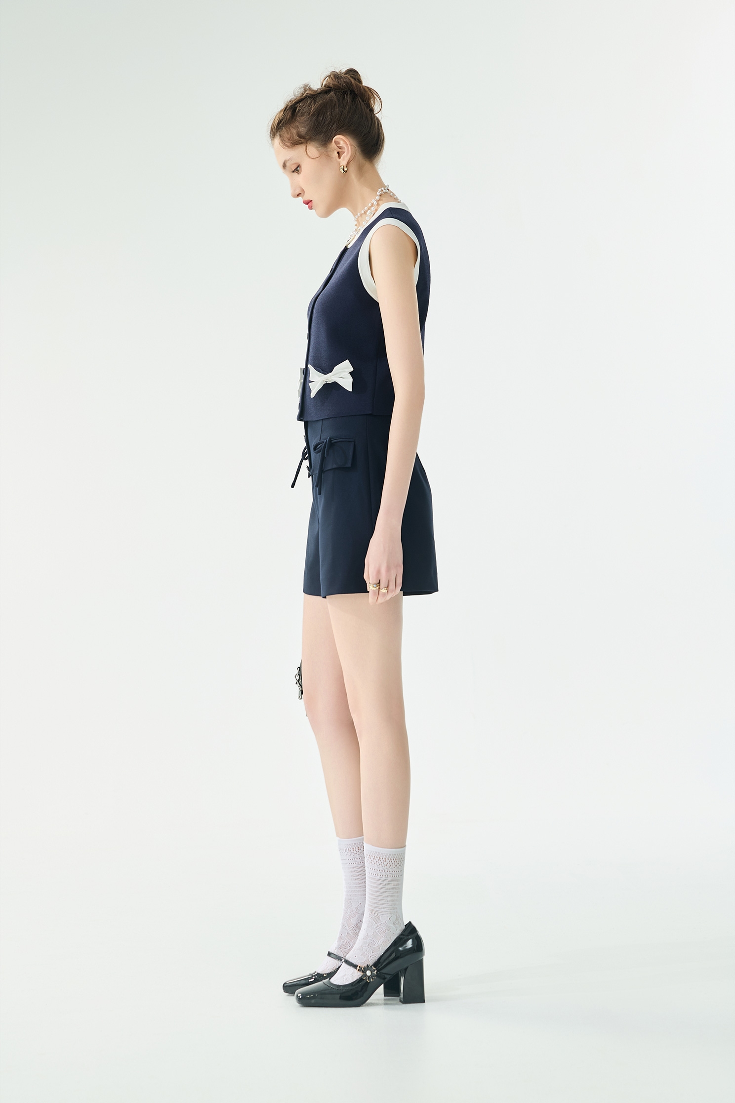 經典海軍藍針織配色背心經典海軍藍針織配色背心,一般背心,一般背心馬甲,上衣,春夏穿搭,背心,蝴蝶結,針織,針織背心