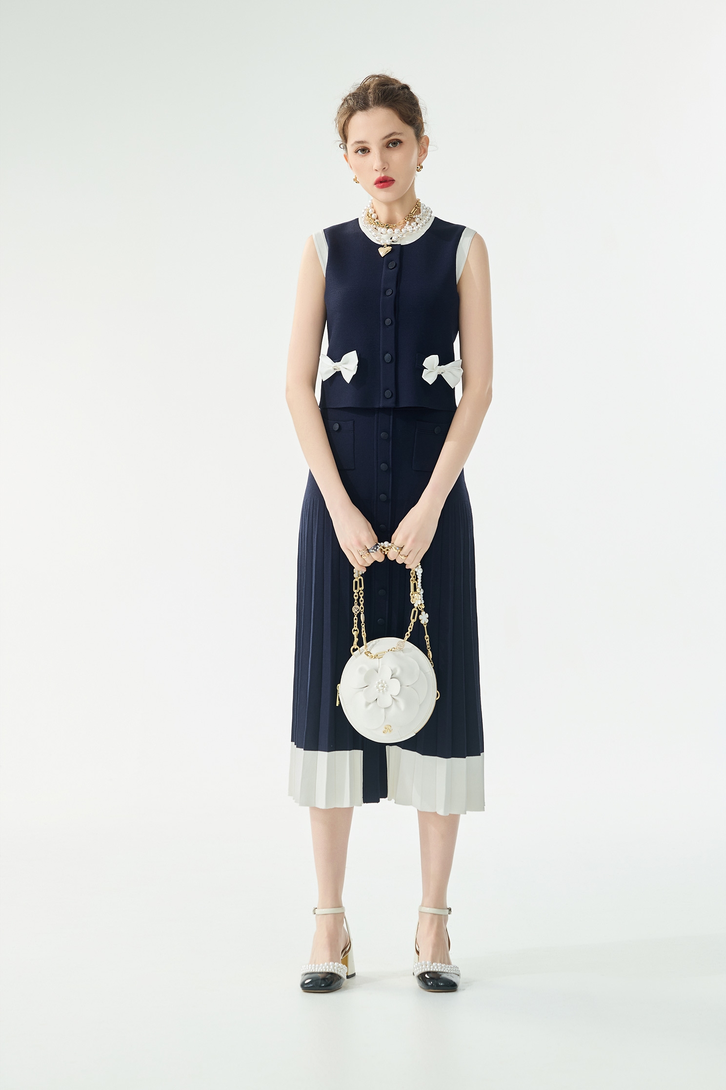 經典海軍藍針織配色背心經典海軍藍針織配色背心,一般背心,一般背心馬甲,上衣,春夏穿搭,背心,蝴蝶結,針織,針織背心