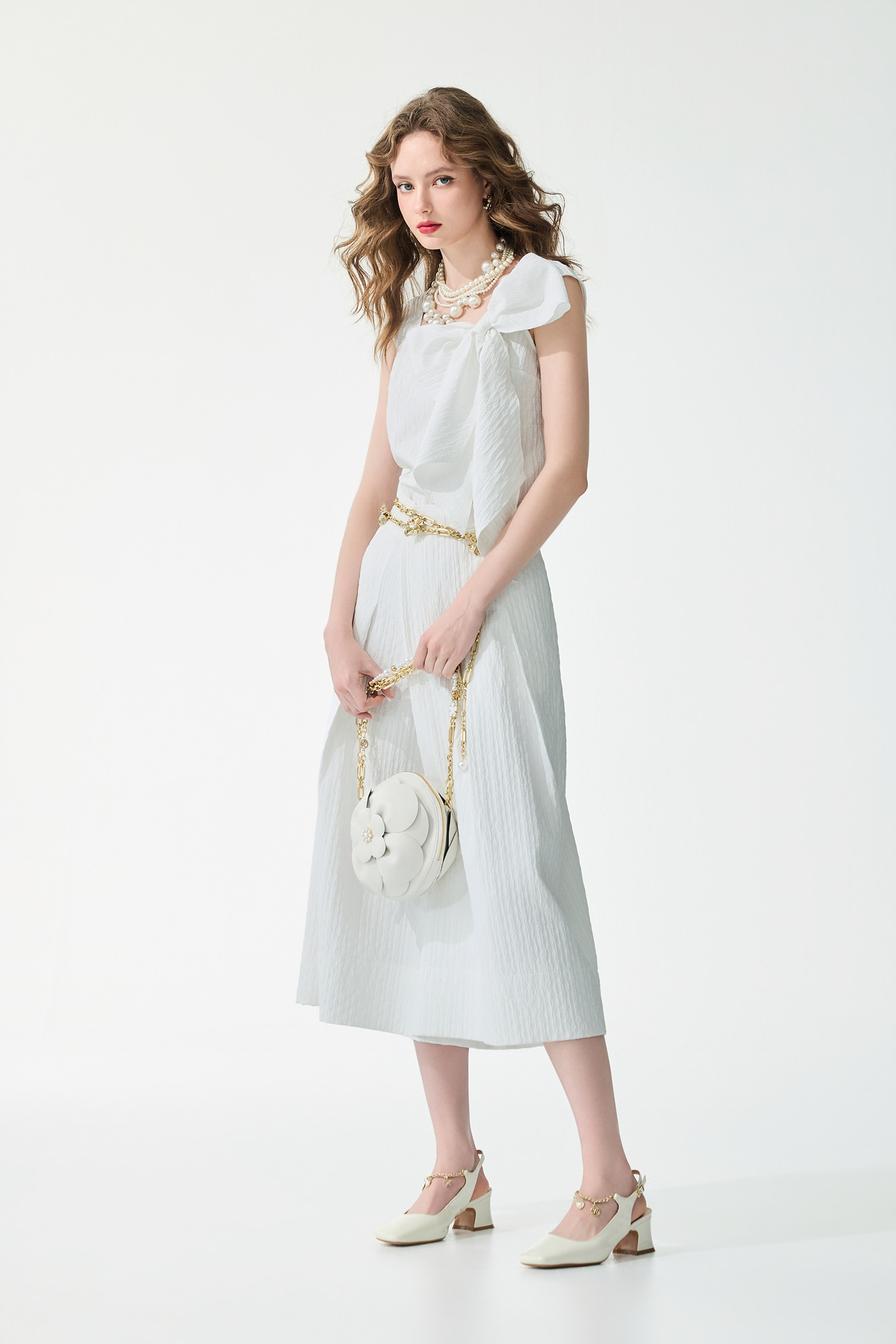 立體壓花飾綁結上衣立體壓花飾綁結上衣,一般背心,一般背心馬甲,上衣,人氣商品,春夏穿搭,白色背心,背心,蝴蝶結