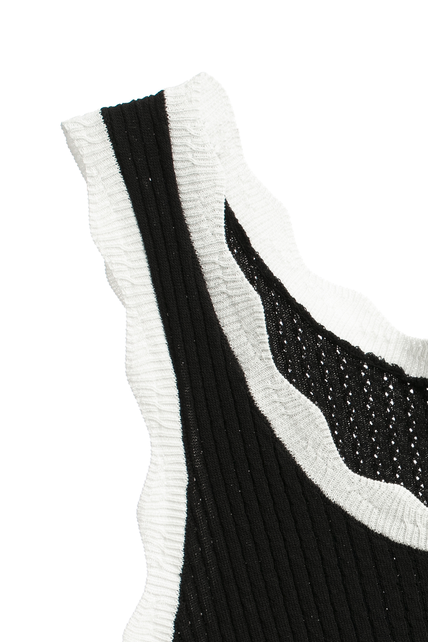 黑白配色弧度花邊造型背心黑白配色弧度花邊造型背心,一般背心,一般背心馬甲,人氣商品,春夏穿搭,背心,針織,針織背心,黑色上衣,黑色背心