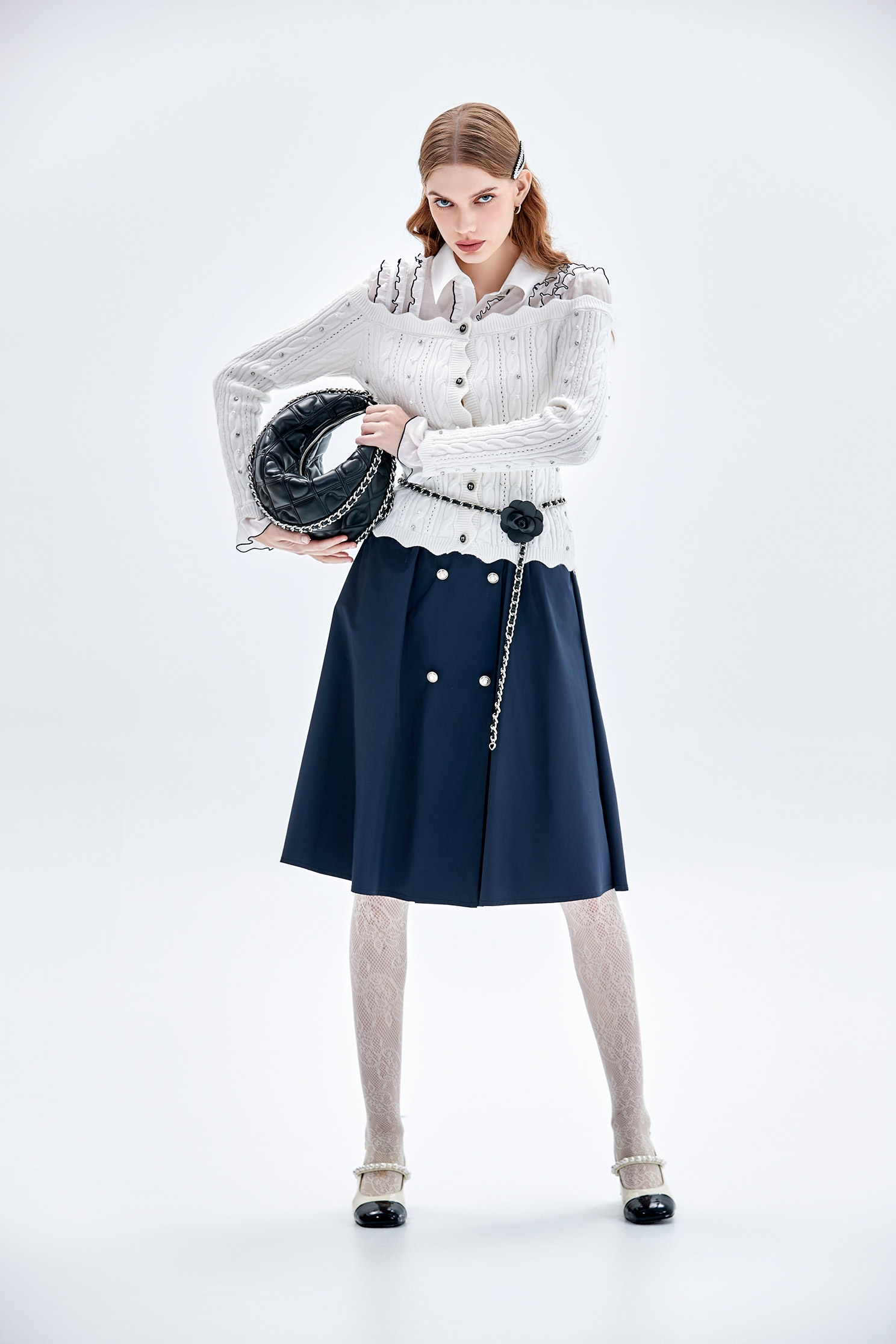 鑲色邊荷葉針織上衣鑲色邊荷葉針織上衣,上衣,人氣商品,珍珠,白色上衣,秋冬穿搭,荷葉,蝴蝶結,針織,針織衫