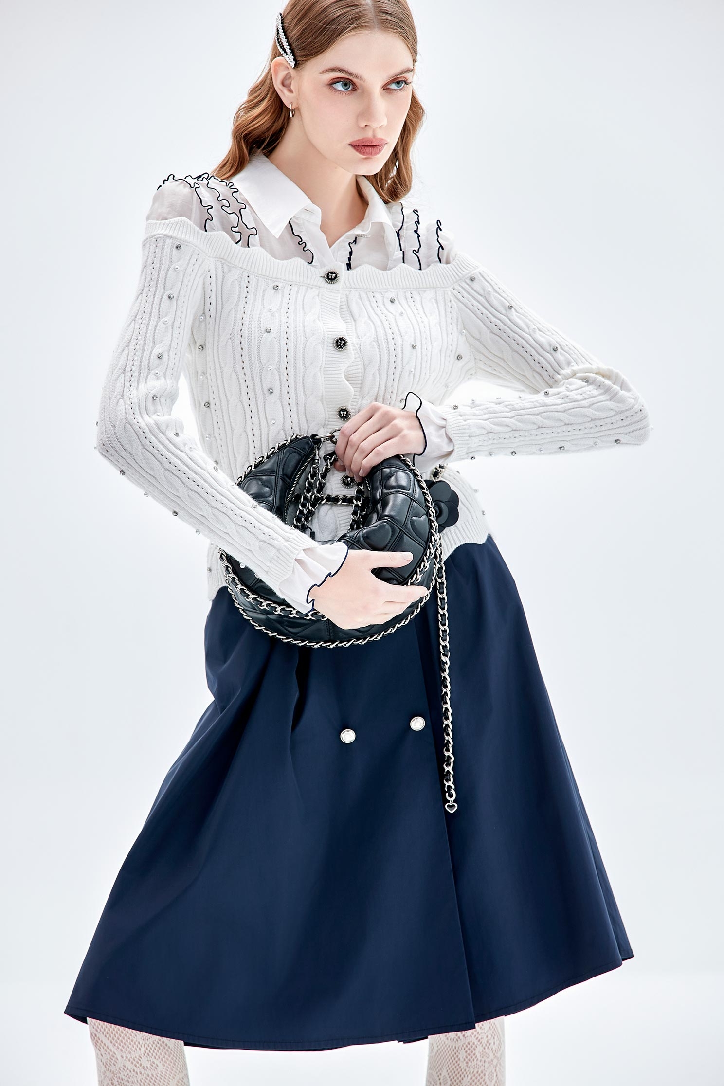 鑲色邊荷葉針織上衣鑲色邊荷葉針織上衣,上衣,人氣商品,珍珠,白色上衣,秋冬穿搭,荷葉,蝴蝶結,針織,針織衫