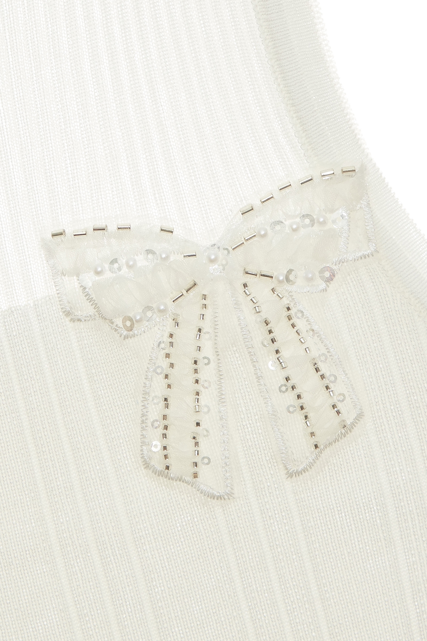 綴蝴蝶結針織背心綴蝴蝶結針織背心,一般背心,一般背心馬甲,上衣,春夏穿搭,無袖背心,白色背心,背心,蝴蝶結,透膚上衣,針織,針織上衣,針織背心