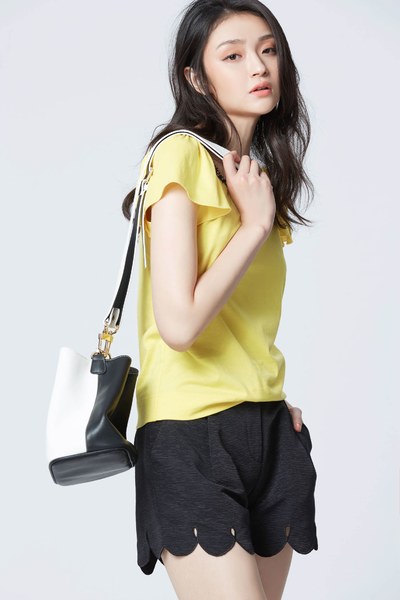 Bright yellow top with puff sleeves