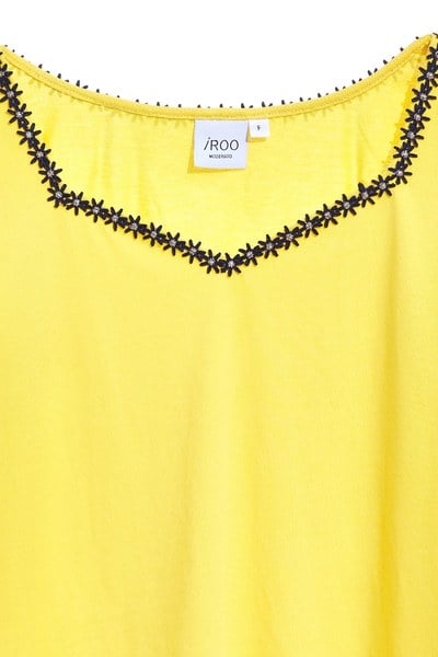 Bright yellow top with puff sleeves
