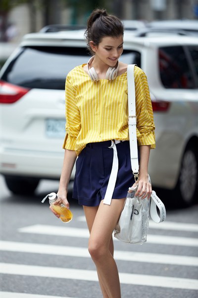 Energetic yellow top with knot sleeves