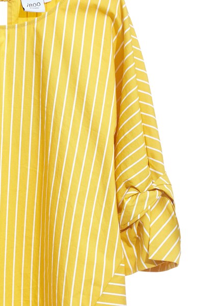 Energetic yellow top with knot sleeves
