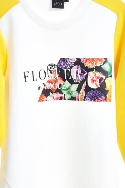 iROO x Flower in Vogue color spliced long sleeves with irregular cutting design